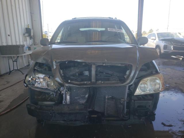 Photo 5 from auction – 2005 KIA SEDONA EX with VIN KNDUP131456629630