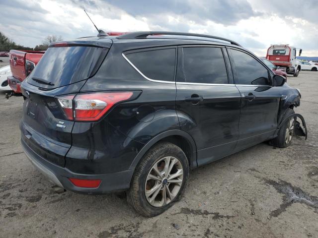 Photo 3 from auction – 2018 FORD ESCAPE SE with VIN 1FMCU9GD4JUC12467