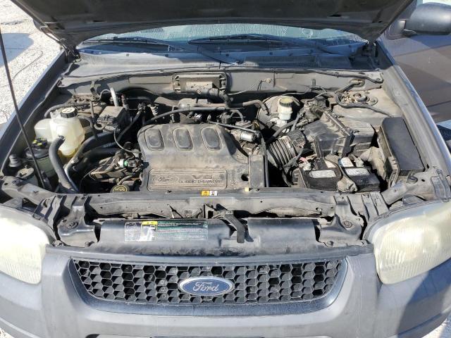 Photo 12 from auction – 2003 FORD ESCAPE XLS with VIN 1FMYU02113KB90229