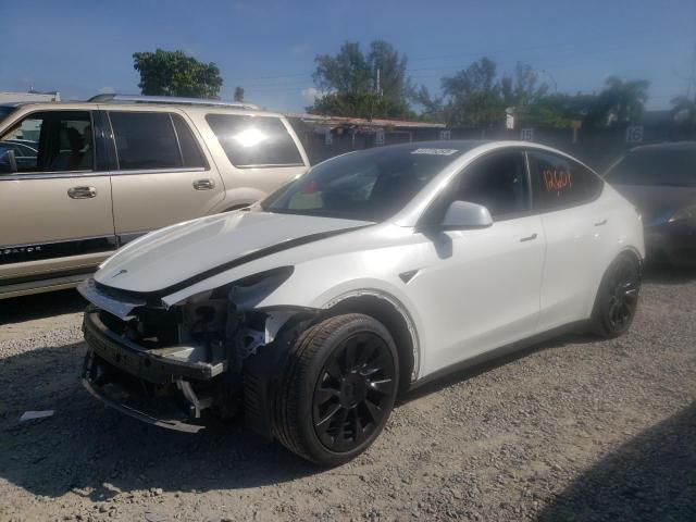 TESLA MODEL Y 2022 with VIN 7SAYGAEE5NF433172 - Photo from auction