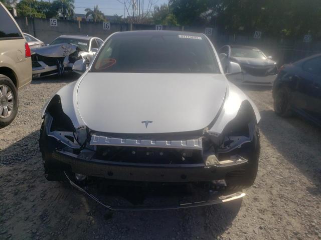 Photo 5 from auction – 2022 TESLA MODEL Y with VIN 7SAYGAEE5NF433172