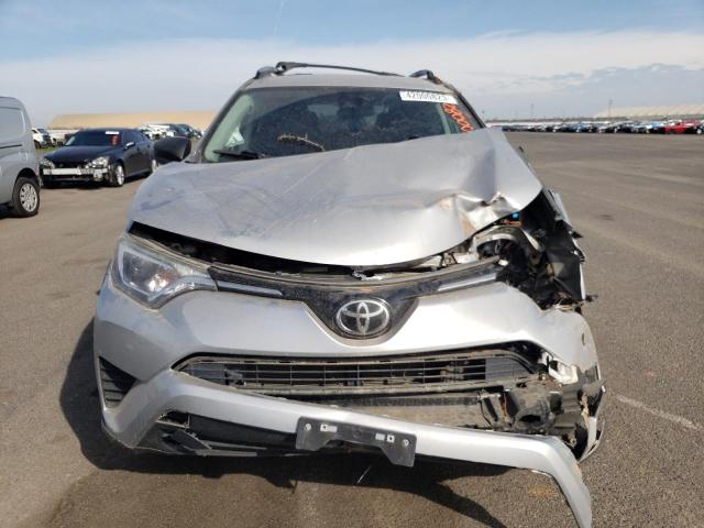 Photo 5 from auction – 2018 TOYOTA RAV4 LE with VIN 2T3BFREV2JW761335