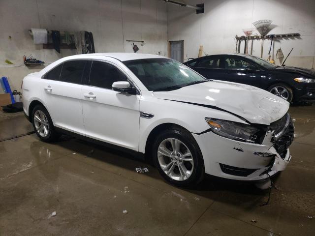 Photo 4 from auction – 2014 FORD TAURUS SEL with VIN 1FAHP2E86EG140583
