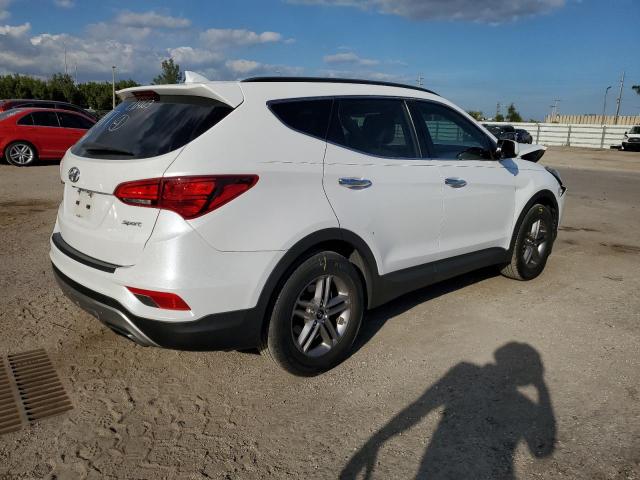 Photo 3 from auction – 2017 HYUNDAI SANTA FE S with VIN 5NMZU3LB8HH024987