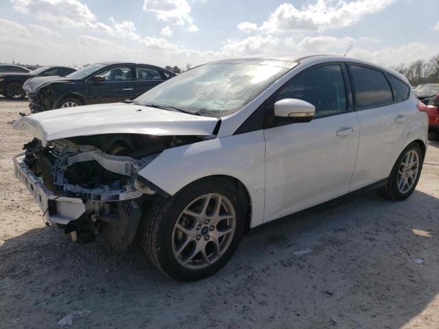 FORD FOCUS SE 2015 with VIN 1FADP3K21FL358363 - Photo from auction