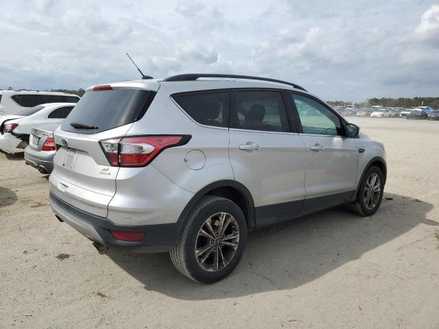Photo 3 from auction – 2018 FORD ESCAPE SE with VIN 1FMCU0GD4JUB47731