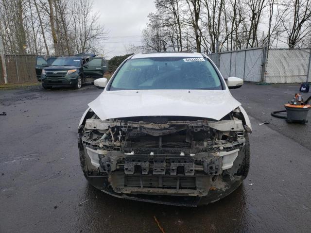 Photo 5 from auction – 2015 FORD FOCUS TITA with VIN 1FADP3J28FL257063