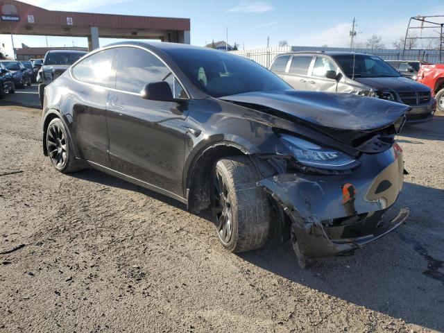 Photo 4 from auction – 2022 TESLA MODEL Y with VIN 7SAYGDEEXNF423187