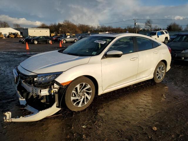 HONDA CIVIC EX 2018 with VIN 2HGFC2F75JH577283 - Photo from auction