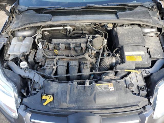 Photo 11 from auction – 2014 FORD FOCUS SE with VIN 1FADP3F28EL207299