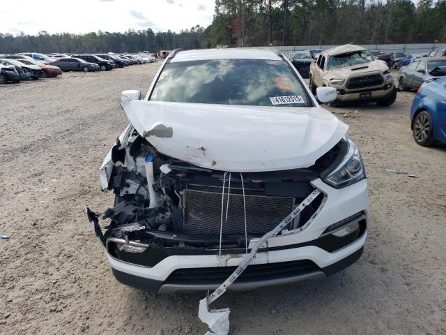 Photo 5 from auction – 2018 HYUNDAI SANTA FE S with VIN 5NMZU3LB2JH060891
