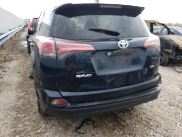 Photo 6 from auction – 2018 TOYOTA RAV4 LE with VIN JTMZFREV6JJ170681
