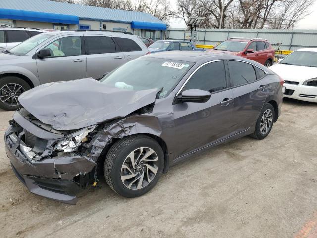 HONDA CIVIC EX 2018 with VIN 19XFC2F74JE034792 - Photo from auction