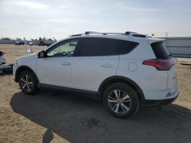 Photo 2 from auction – 2016 TOYOTA RAV4 XLE with VIN JTMWFREV7GJ088924