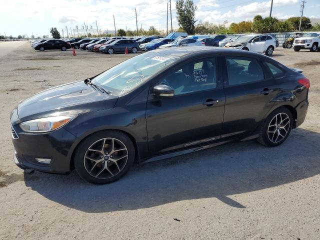 FORD FOCUS SE 2015 with VIN 1FADP3F25FL354343 - Photo from auction