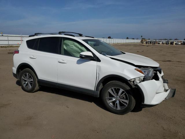 Photo 4 from auction – 2016 TOYOTA RAV4 XLE with VIN JTMWFREV7GJ088924