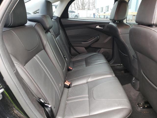 Photo 10 from auction – 2014 FORD FOCUS TITA with VIN 1FADP3J28EL443054