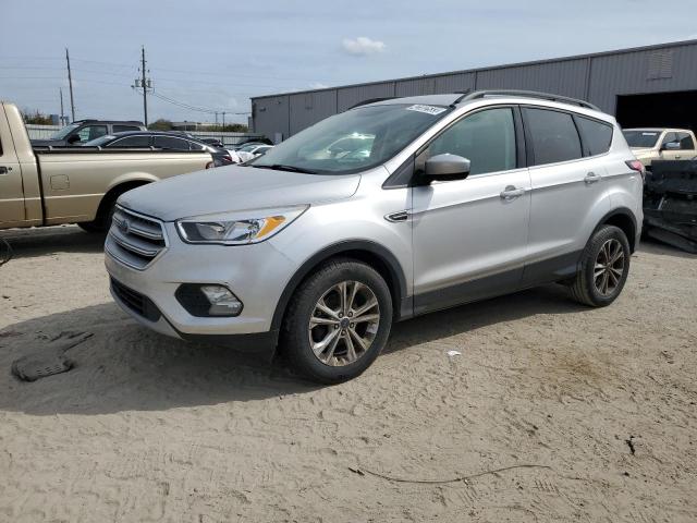 FORD ESCAPE SE 2018 with VIN 1FMCU0GD4JUB47731 - Photo from auction