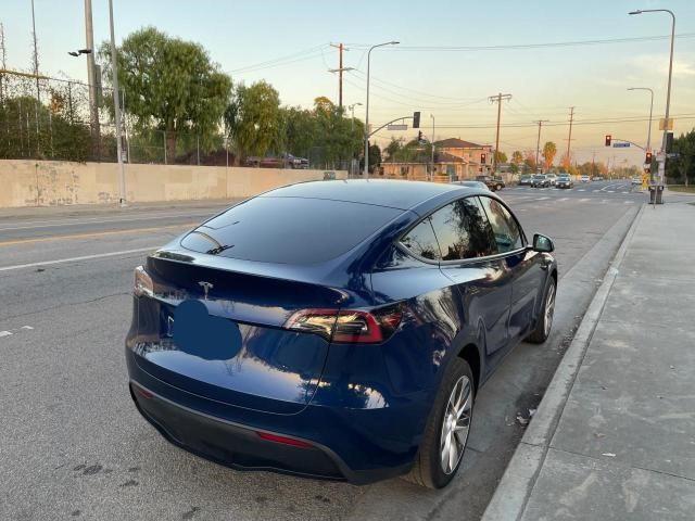Photo 4 from auction – 2022 TESLA MODEL Y with VIN 7SAYGDEE5NF308061
