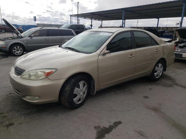 TOYOTA CAMRY LE 2003 with VIN 4T1BE32K63U727811 - Photo from auction