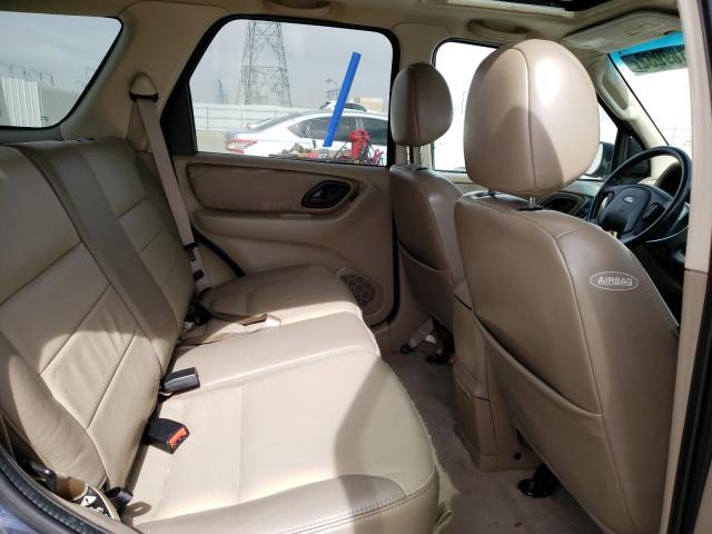Photo 11 from auction – 2003 FORD ESCAPE LIM with VIN 1FMCU94123KC06059