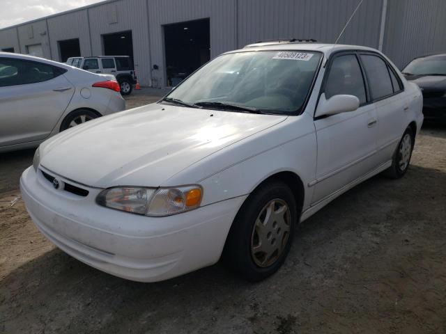 TOYOTA COROLLA 1999 with VIN 2T1BR12E3XC166588 - Photo from auction