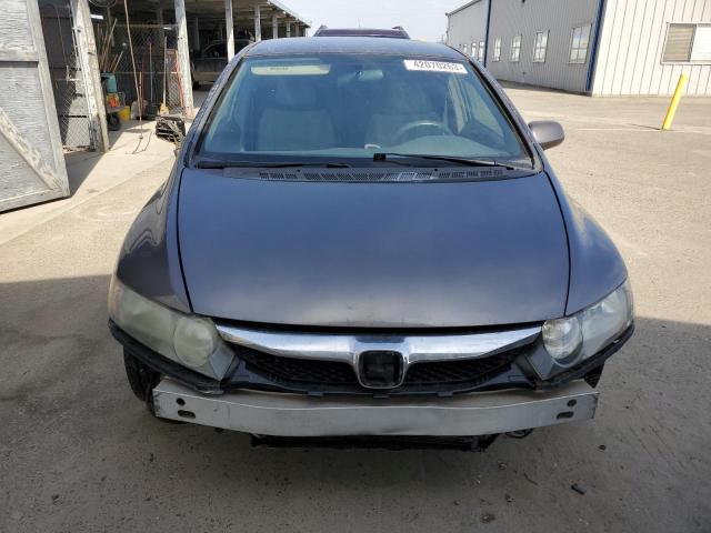 Photo 5 from auction – 2011 HONDA CIVIC LX with VIN 19XFA1F58BE046122