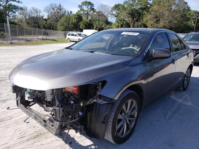 TOYOTA CAMRY LE 2017 with VIN 4T1BF1FK0HU672503 - Photo from auction