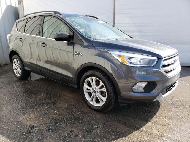 Photo 4 from auction – 2018 FORD ESCAPE SE with VIN 1FMCU0GD1JUA48686
