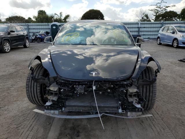 Photo 5 from auction – 2019 TESLA MODEL 3 with VIN 5YJ3E1EB2KF393695