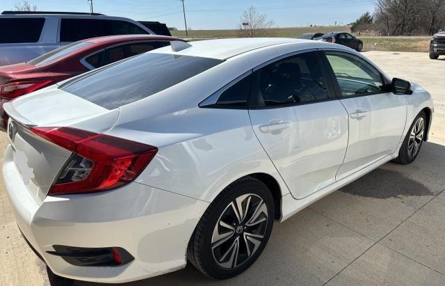Photo 4 from auction – 2018 HONDA CIVIC EX with VIN JHMFC1F30JX040403
