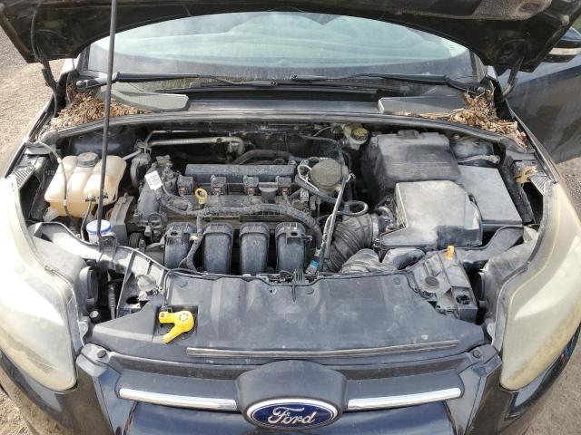 Photo 11 from auction – 2014 FORD FOCUS SE with VIN 1FADP3F23EL109832