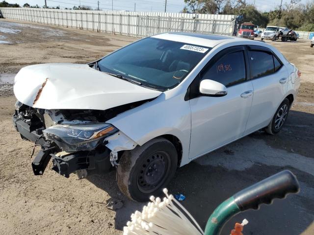 TOYOTA COROLLA L 2018 with VIN 5YFBURHE6JP814128 - Photo from auction