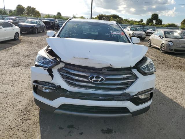 Photo 5 from auction – 2017 HYUNDAI SANTA FE S with VIN 5NMZU3LB8HH024987