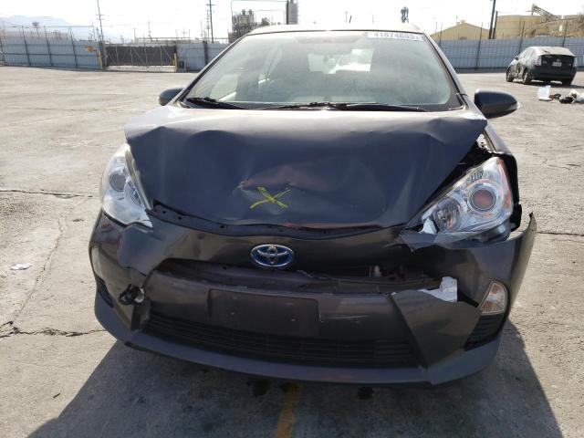 Photo 5 from auction – 2014 TOYOTA PRIUS C with VIN JTDKDTB3XE1569414