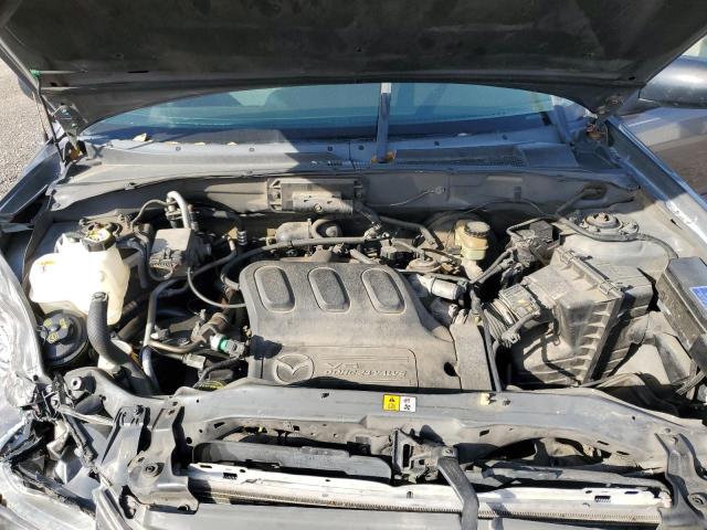 Photo 12 from auction – 2004 MAZDA TRIBUTE LX with VIN 4F2YZ04164KM02255