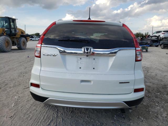 Photo 6 from auction – 2016 HONDA CR-V TOURI with VIN 5J6RM3H94GL005799