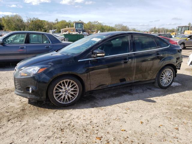 FORD FOCUS TITA 2014 with VIN 1FADP3J28EL236373 - Photo from auction