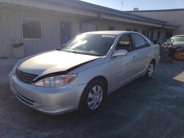 TOYOTA CAMRY LE 2004 with VIN 4T1BE32K64U892453 - Photo from auction