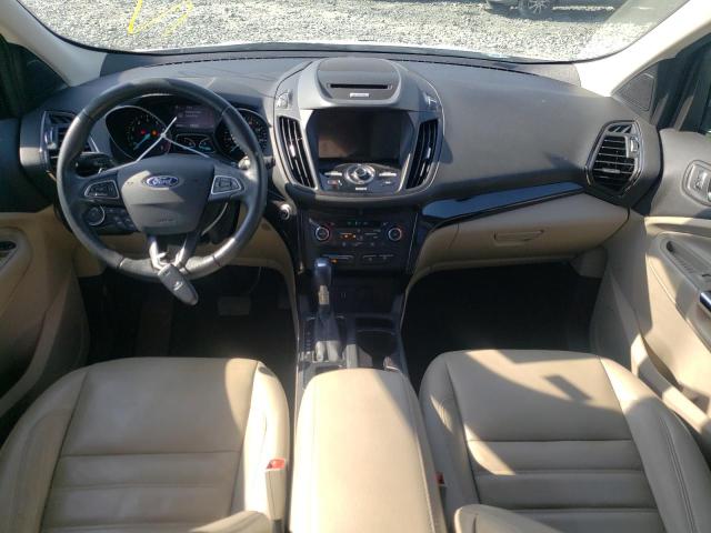 Photo 8 from auction – 2017 FORD ESCAPE TIT with VIN 1FMCU0JD1HUE20563