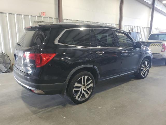 Photo 3 from auction – 2017 HONDA PILOT TOUR with VIN 5FNYF6H96HB066279