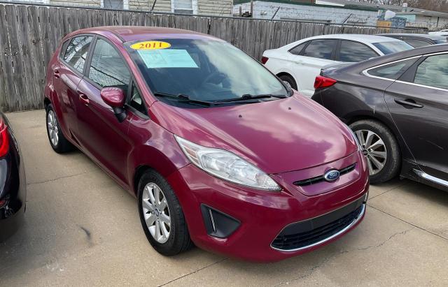 FORD FIESTA SE 2011 with VIN 3FADP4EJ8BM228114 - Photo from auction