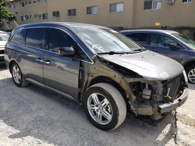 Photo 4 from auction – 2011 HONDA ODYSSEY TO with VIN 5FNRL5H9XBB090664