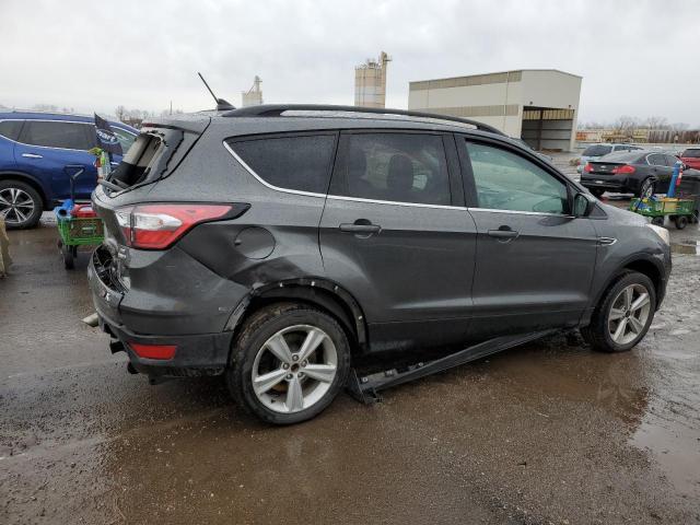 Photo 3 from auction – 2018 FORD ESCAPE SE with VIN 1FMCU9GD9JUB15913