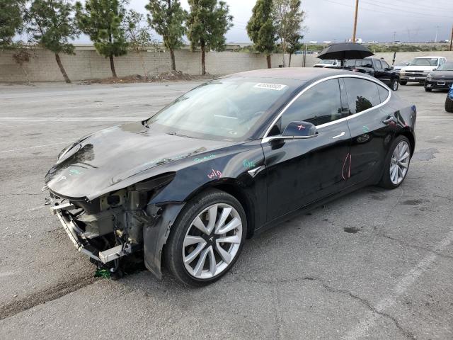 TESLA MODEL 3 2018 with VIN 5YJ3E1EB9JF182735 - Photo from auction