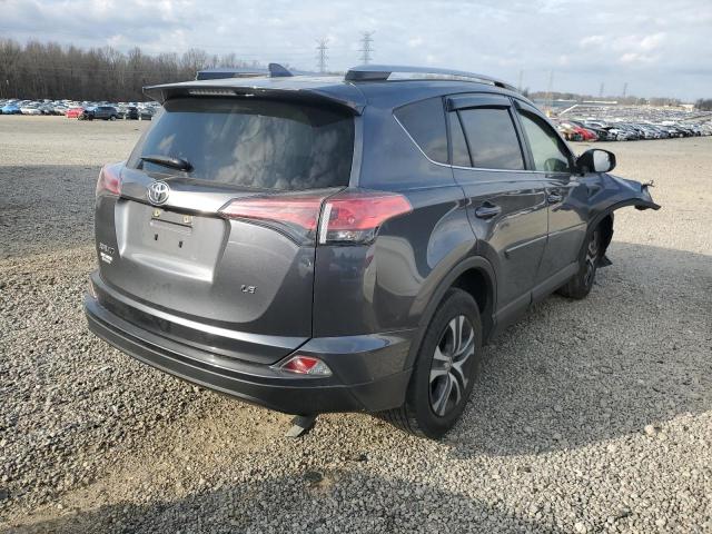 Photo 3 from auction – 2018 TOYOTA RAV4 LE with VIN JTMZFREV6JD129773