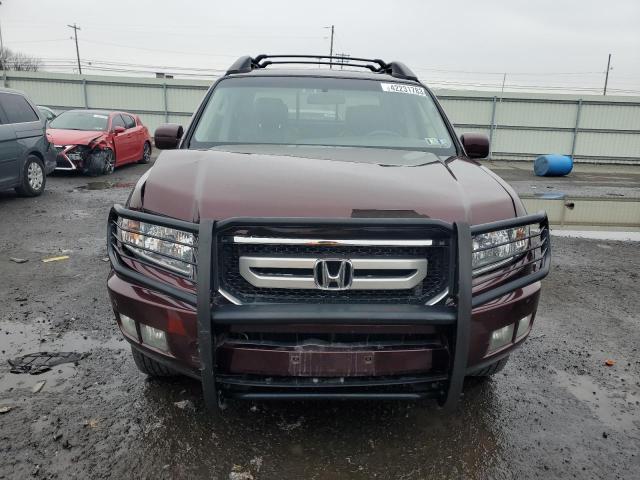 Photo 5 from auction – 2010 HONDA RIDGELINE with VIN 5FPYK1F50AB011936