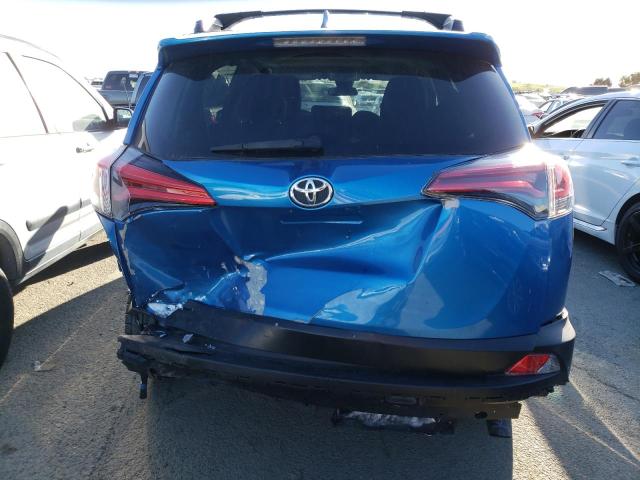 Photo 6 from auction – 2017 TOYOTA RAV4 LE with VIN JTMZFREV8HJ132508