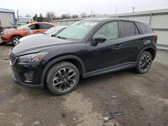 MAZDA CX-5 GT 2016 with VIN JM3KE4DY3G0909448 - Photo from auction