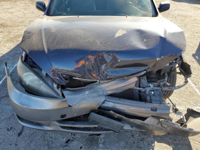 Photo 11 from auction – 2003 TOYOTA CAMRY LE with VIN 4T1BF32K13U062023